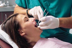 Санация ротовой полости: имплантация зубов, установка керамических конструкций