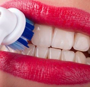Электрическая зубная щетка и ее преимущества